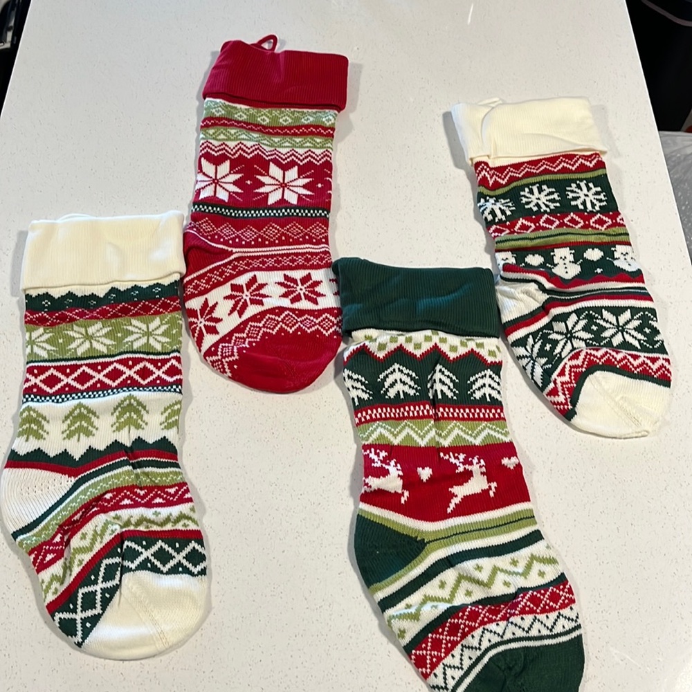 New - Still in bag, never used. package of 4 Christmas Stockings..